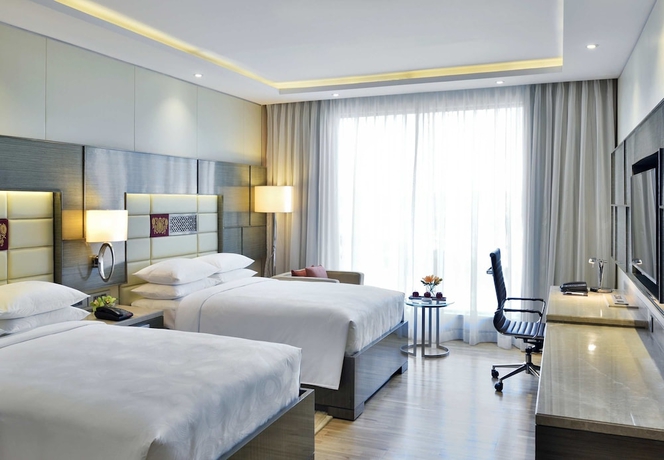Imagen de la habitación del Hotel Jw Marriott Mumbai Sahar Airport. Foto 11