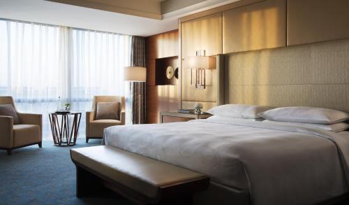 Imagen de la habitación del Hotel Jw Marriott Zhengzhou. Foto 6