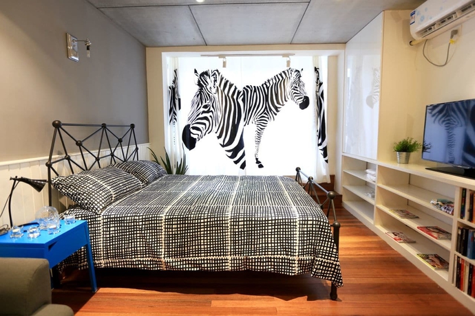 Imagen de la habitación del Hotel Jy Distributed Theme Apartment. Foto 8