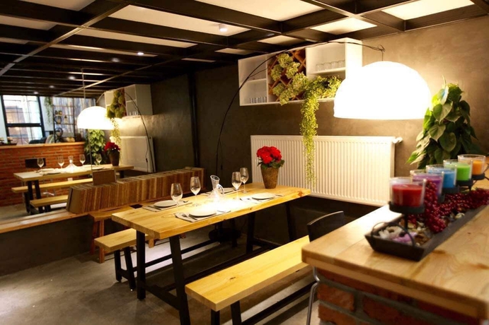 Imagen del bar/restaurante del Hotel Jy Distributed Theme Apartment. Foto 3