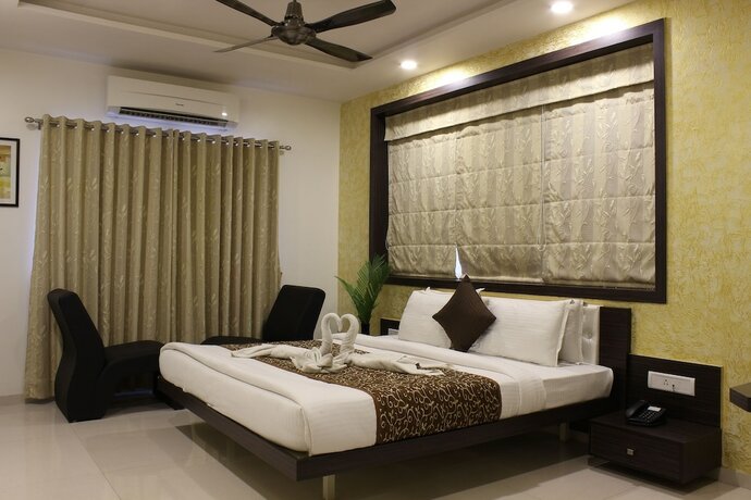 Imagen de la habitación del Hotel Jyoti, Rajkot. Foto 15