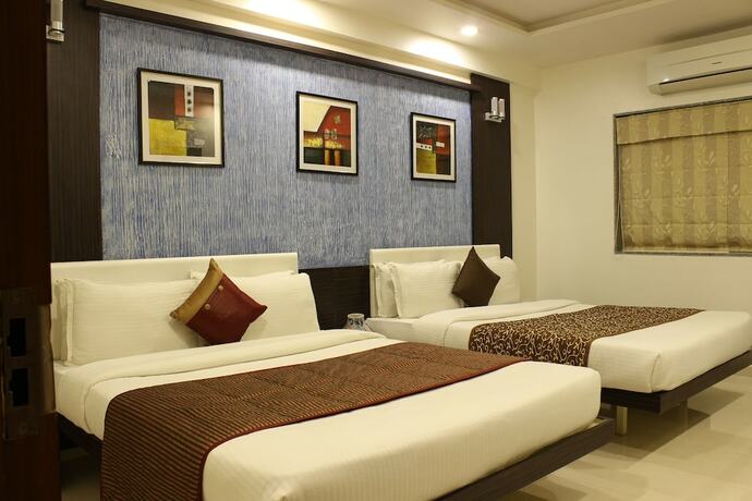 Imagen de la habitación del Hotel Jyoti, Rajkot. Foto 17