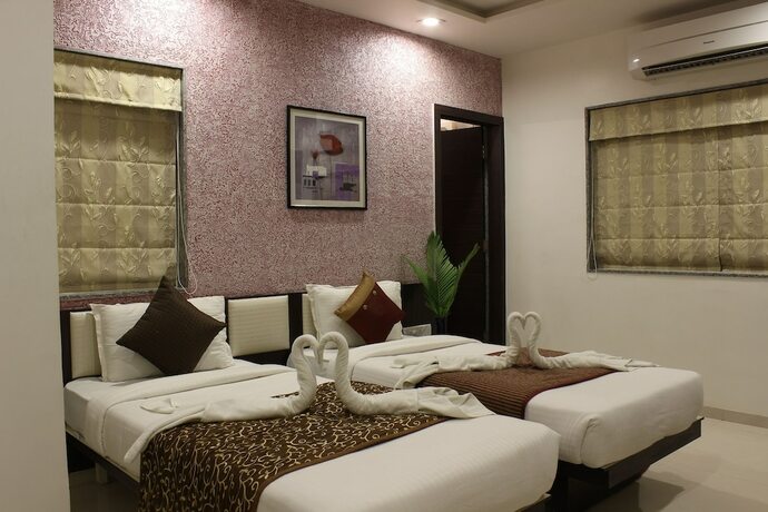 Imagen de la habitación del Hotel Jyoti, Rajkot. Foto 19