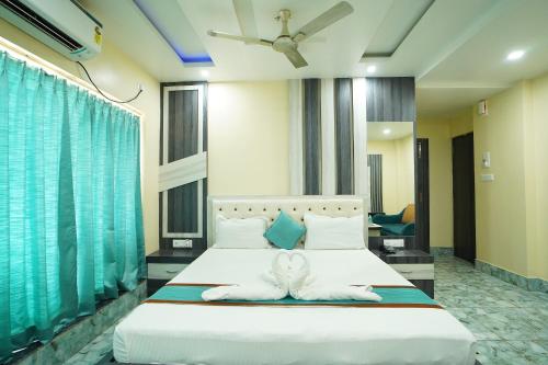 Imagen de la habitación del Hotel Jyotsna International. Foto 19