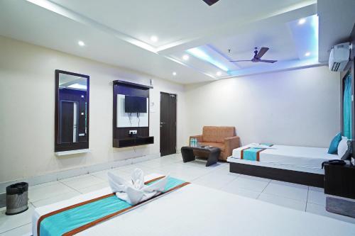 Imagen de la habitación del Hotel Jyotsna International. Foto 20