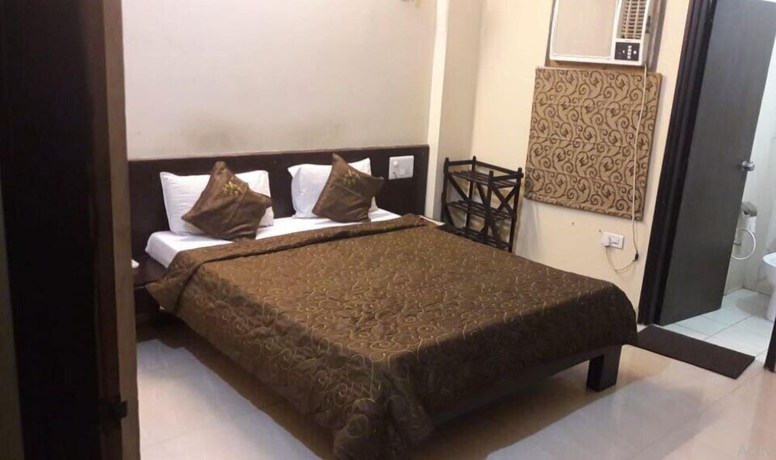 Imagen de la habitación del Hotel Jypore Saffron Inn and Suites. Foto 3