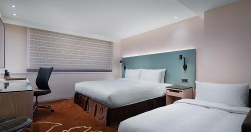 Imagen de la habitación del Hotel K Hotel Taipei II. Foto 2
