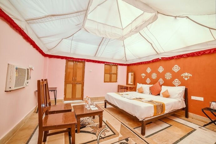 Imagen de la habitación del Hotel K K Resorts and Camp. Foto 18