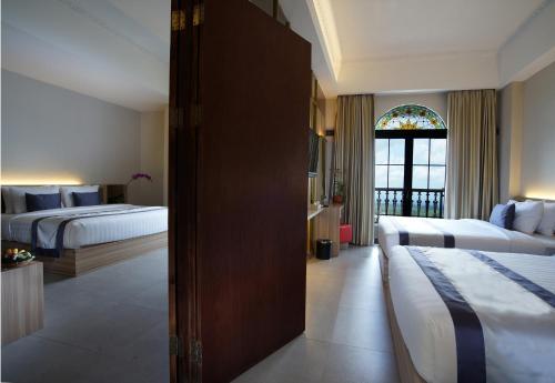 Imagen de la habitación del Hotel K Kaliurang. Foto 7