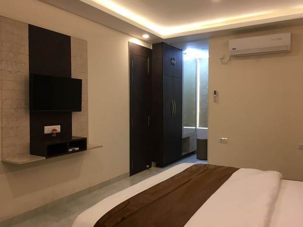 Imagen de la habitación del Hotel K3 Club Residency. Foto 12