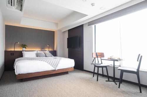 Imagen de la habitación del Hotel KABIN Kyoto. Foto 13