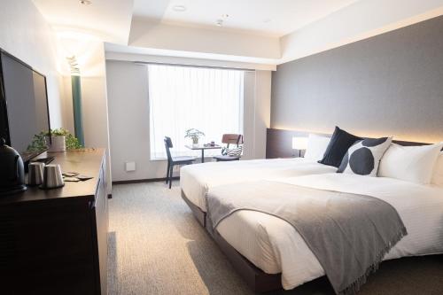 Imagen de la habitación del Hotel KABIN Kyoto. Foto 14