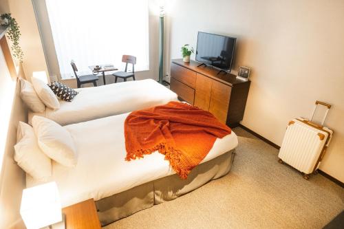 Imagen de la habitación del Hotel KABIN Kyoto. Foto 17