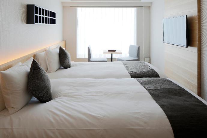 Imagen de la habitación del Hotel KABIN Taka. Foto 9