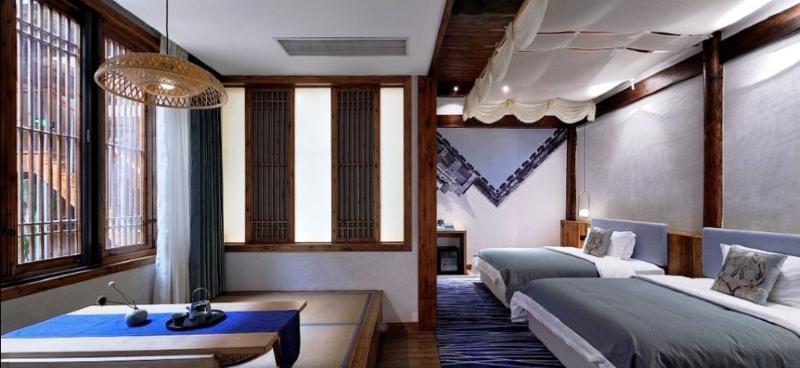 Imagen de la habitación del Hotel KAI YUAN LIFE HUAN CHUN HOTEL. Foto 11