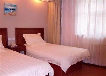 Imagen de la habitación del Hotel KAIBO HOTEL. Foto 3