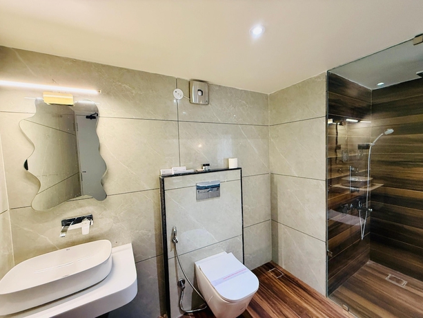 Imagen de la habitación del Hotel KAMA, Patna. Foto 5