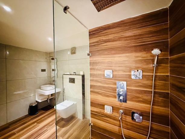 Imagen de la habitación del Hotel KAMA, Patna. Foto 8
