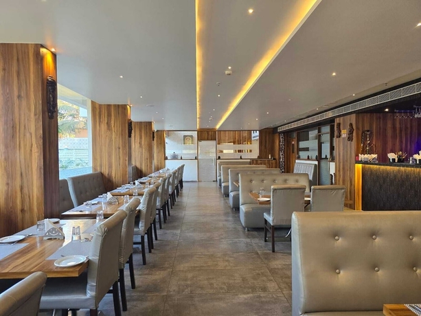 Imagen del bar/restaurante del Hotel KAMAT\'S DAFFODIL RESORT. Foto 4