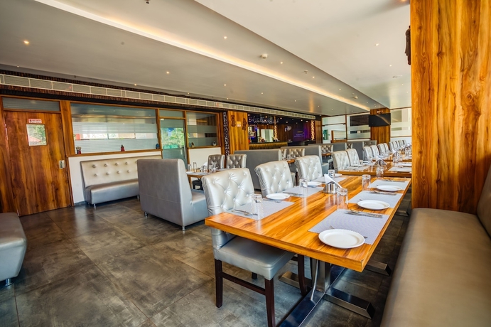 Imagen del bar/restaurante del Hotel KAMAT\'S DAFFODIL RESORT. Foto 5