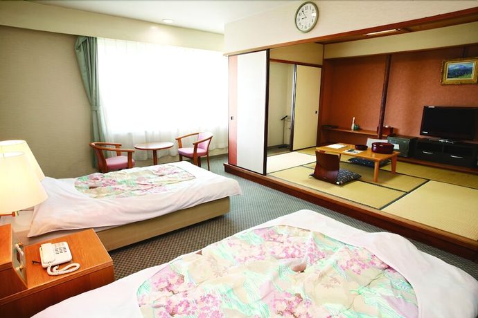 Imagen de la habitación del Hotel KAMENOI HOTEL Yanagawa. Foto 7