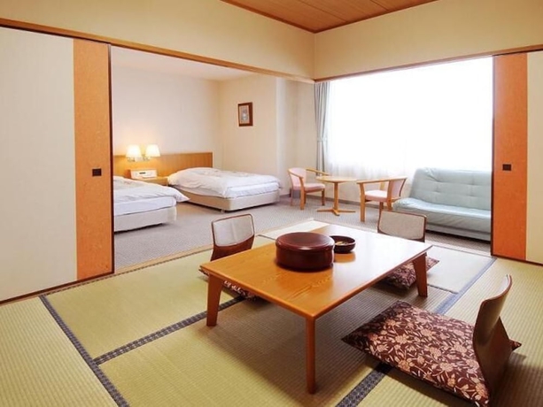 Imagen de la habitación del Hotel KAMENOI HOTEL Yanagawa. Foto 8