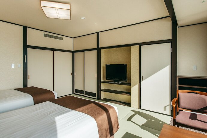 Imagen de la habitación del Hotel KAMENOI Kumano Tanabe. Foto 14