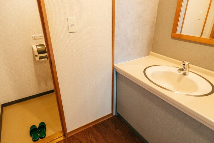 Imagen de la habitación del Hotel KAMENOI Kumano Tanabe. Foto 15