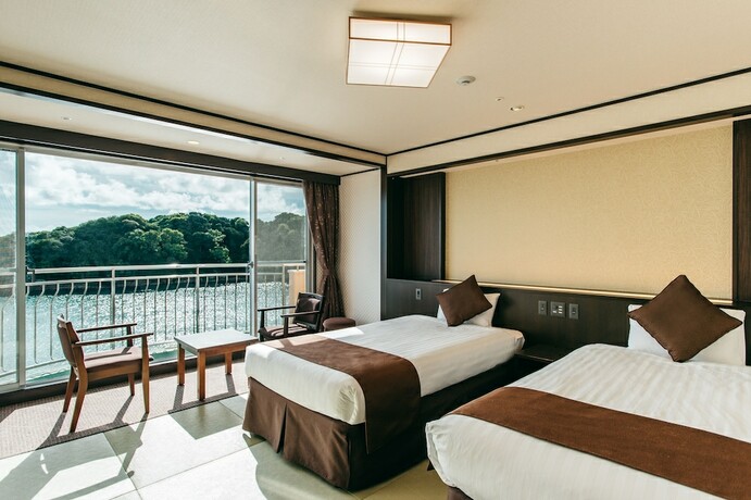 Imagen de la habitación del Hotel KAMENOI Kumano Tanabe. Foto 22