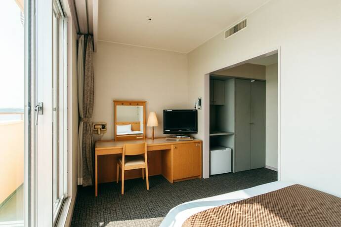 Imagen de la habitación del Hotel KAMENOI Kumano Tanabe. Foto 28