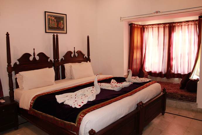 Imagen de la habitación del Hotel KANER BAGH A HERITAGE BOUTIQUE HOTEL. Foto 16