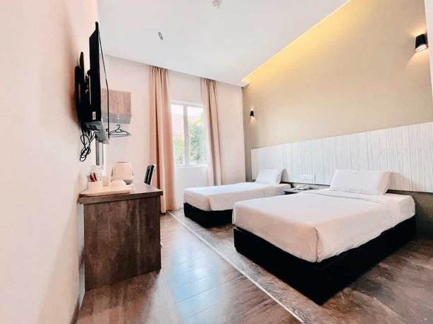Imagen de la habitación del Hotel KARANG TIMUR MOTEL. Foto 2
