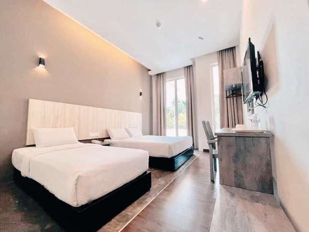 Imagen de la habitación del Hotel KARANG TIMUR MOTEL. Foto 3