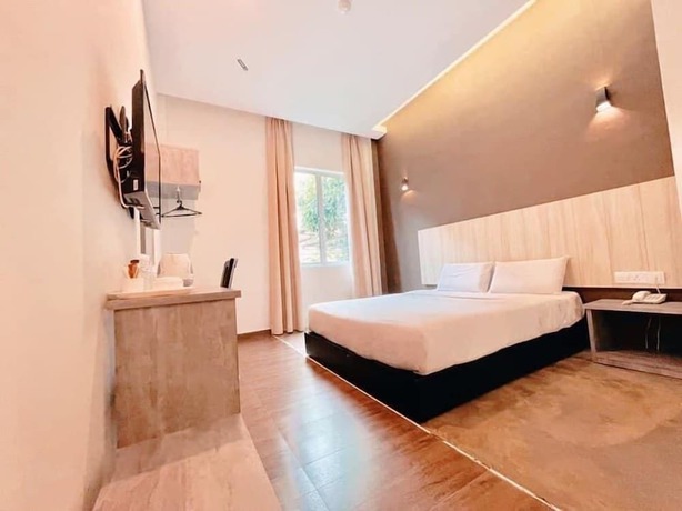 Imagen de la habitación del Hotel KARANG TIMUR MOTEL. Foto 6