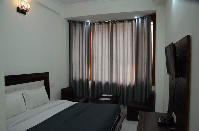 Imagen de la habitación del Hotel KC Regency. Foto 6