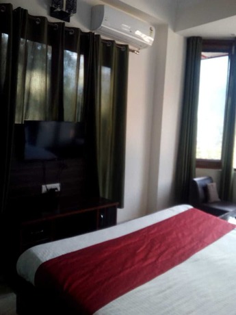 Imagen de la habitación del Hotel KC Regency. Foto 9