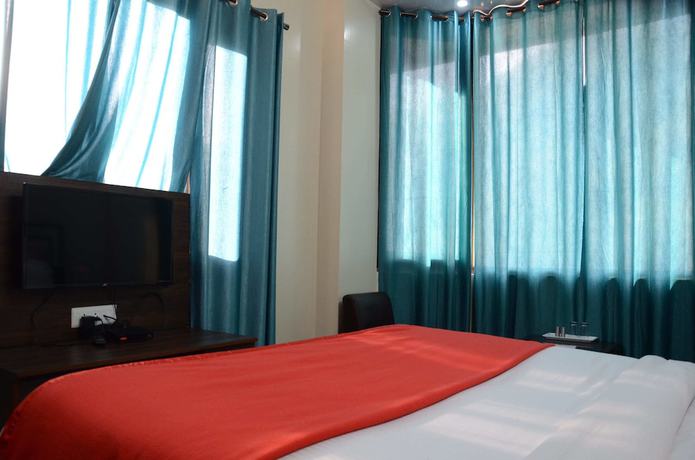 Imagen de la habitación del Hotel KC Regency. Foto 10