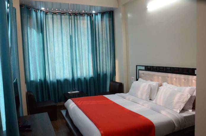 Imagen de la habitación del Hotel KC Regency. Foto 11