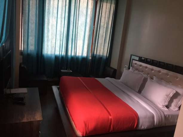 Imagen de la habitación del Hotel KC Regency. Foto 16