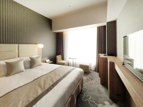 Imagen de la habitación del Hotel KEIHAN TSUKIJI GINZA GRANDE. Foto 7