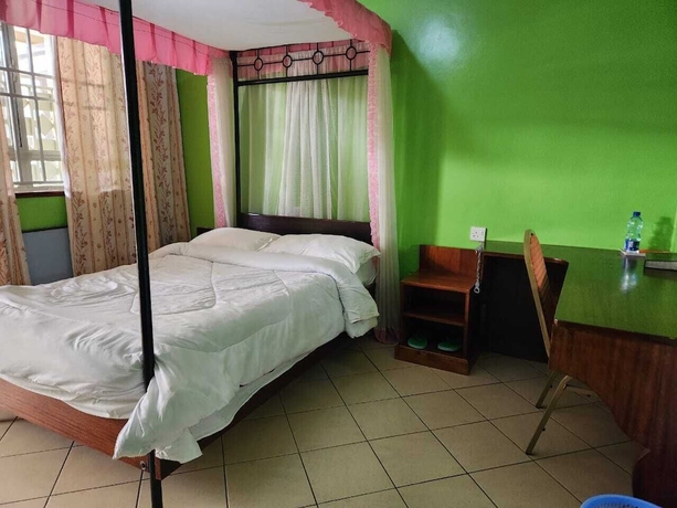 Imagen de la habitación del Hotel KENLANDS RELAX INN. Foto 8