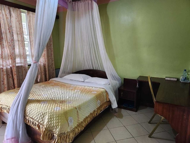 Imagen de la habitación del Hotel KENLANDS RELAX INN. Foto 10