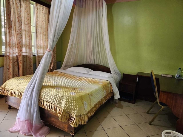 Imagen de la habitación del Hotel KENLANDS RELAX INN. Foto 11