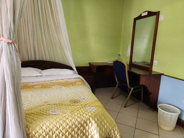 Imagen de la habitación del Hotel KENLANDS RELAX INN. Foto 12