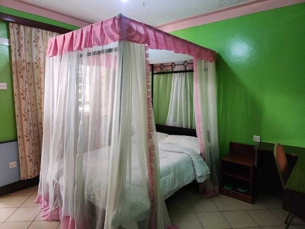 Imagen de la habitación del Hotel KENLANDS RELAX INN. Foto 14