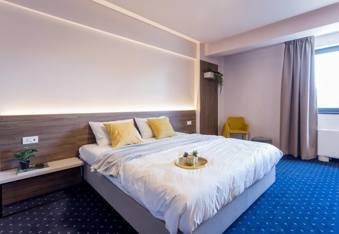Imagen de la habitación del Hotel KEPLER RESIDENCE. Foto 4