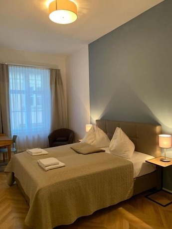 Imagen de la habitación del Hotel KH Apartments. Foto 11