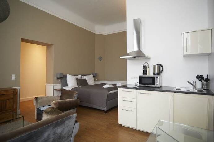 Imagen de la habitación del Hotel KH Apartments. Foto 12