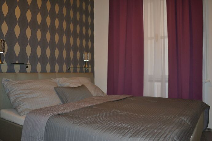 Imagen de la habitación del Hotel KH Apartments. Foto 14