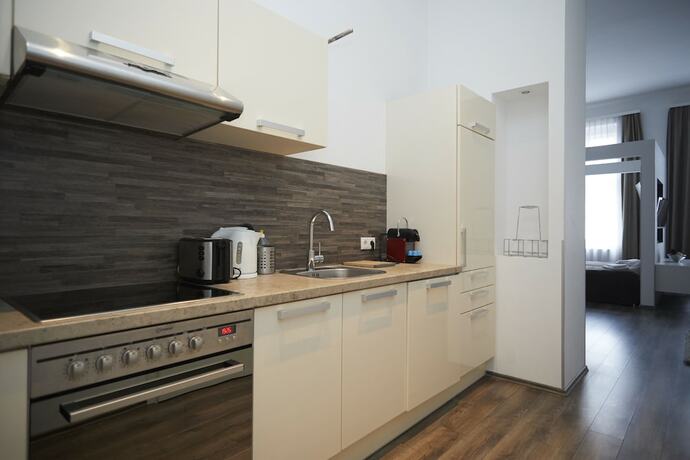 Imagen de la habitación del Hotel KH Apartments. Foto 18
